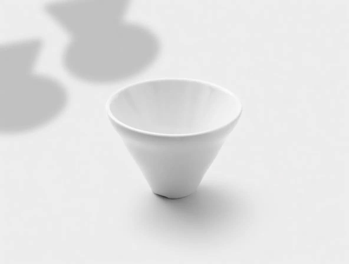 Clean studio product shot of the same coffee dripper