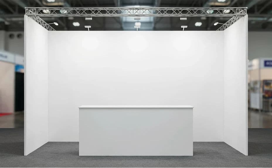 Empty exhibition booth shell with blank walls