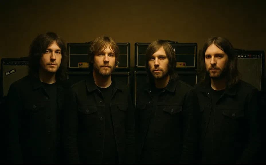 Band press photo of the group in a moody indoor setup