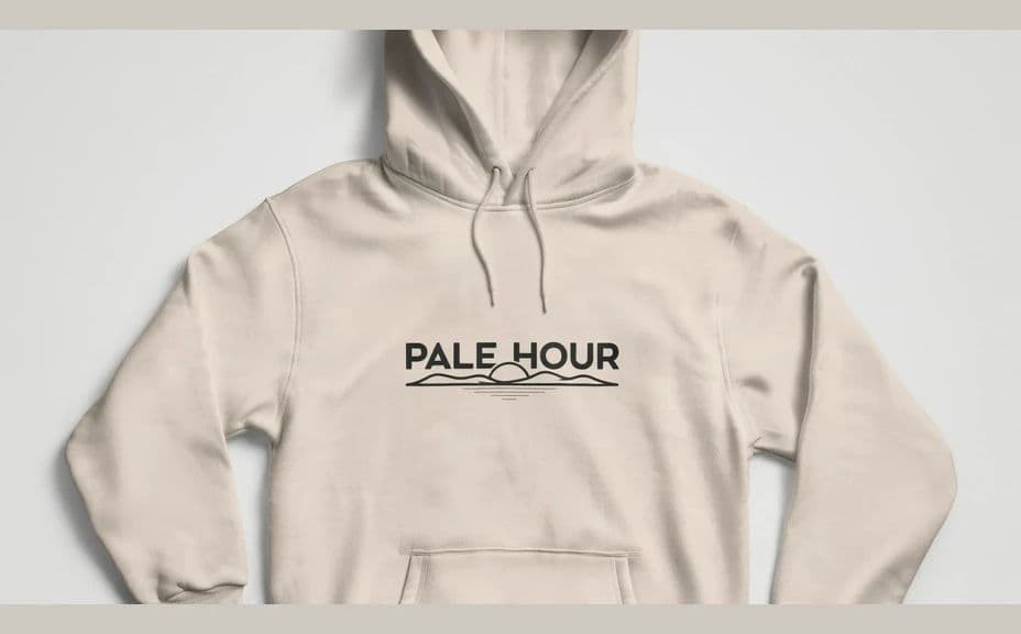 Hoodie mockup in a light colourway with a chest print