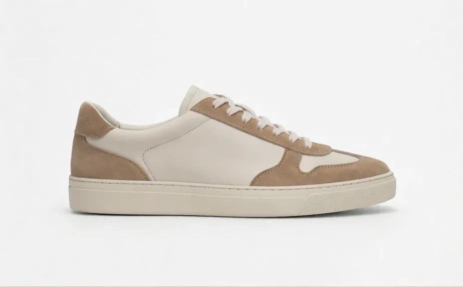 Pair of trainers photographed in profile on a bright seamless white background