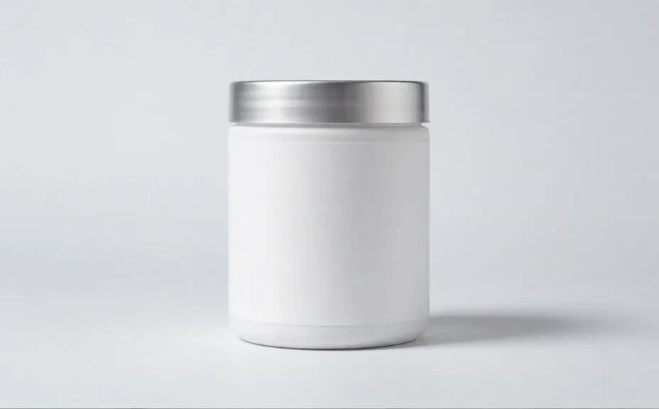 Supplement tub on a pale seamless backdrop under soft even studio light