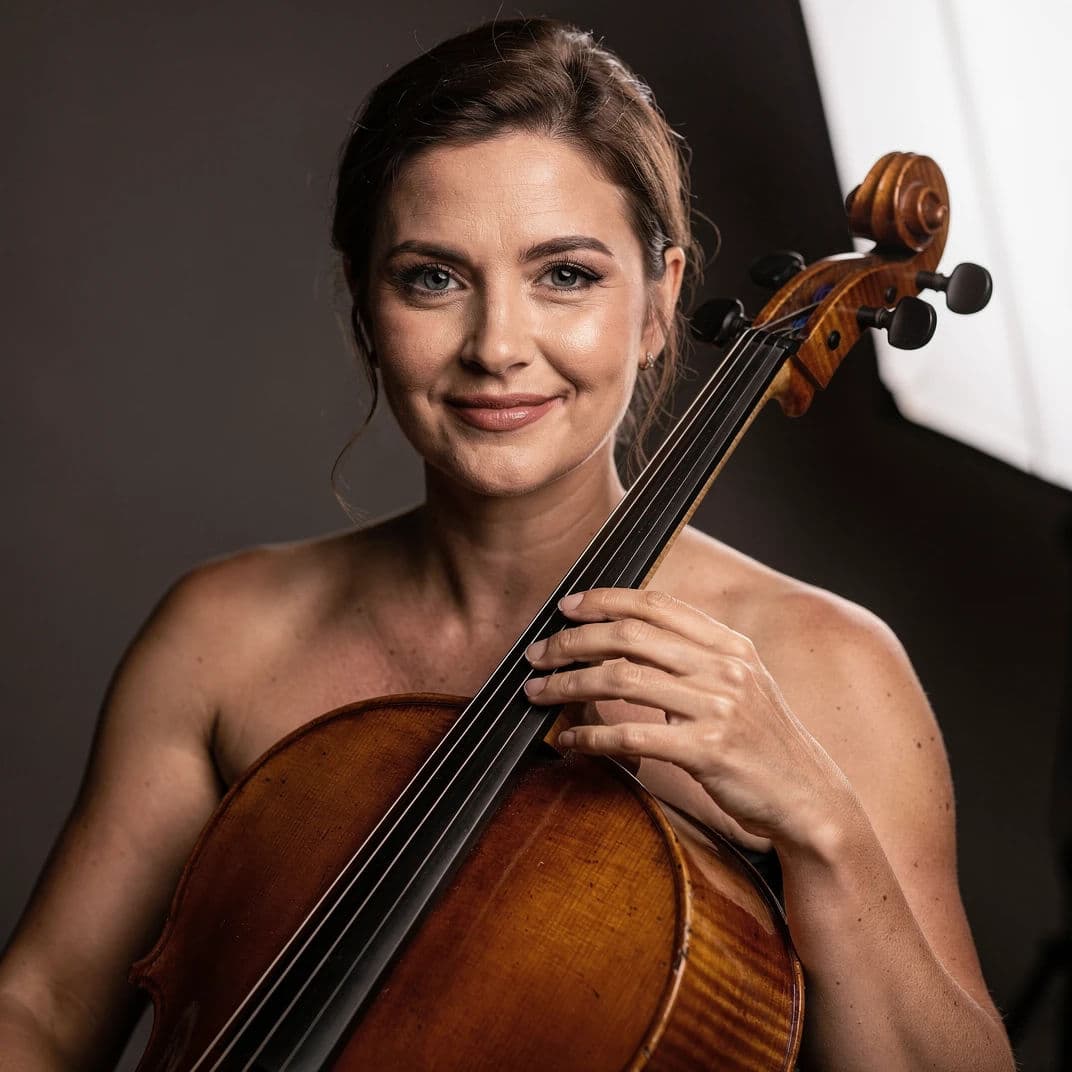 Headshot of a musician holding an instrument in soft studio light, generated with Flux 2 Pro