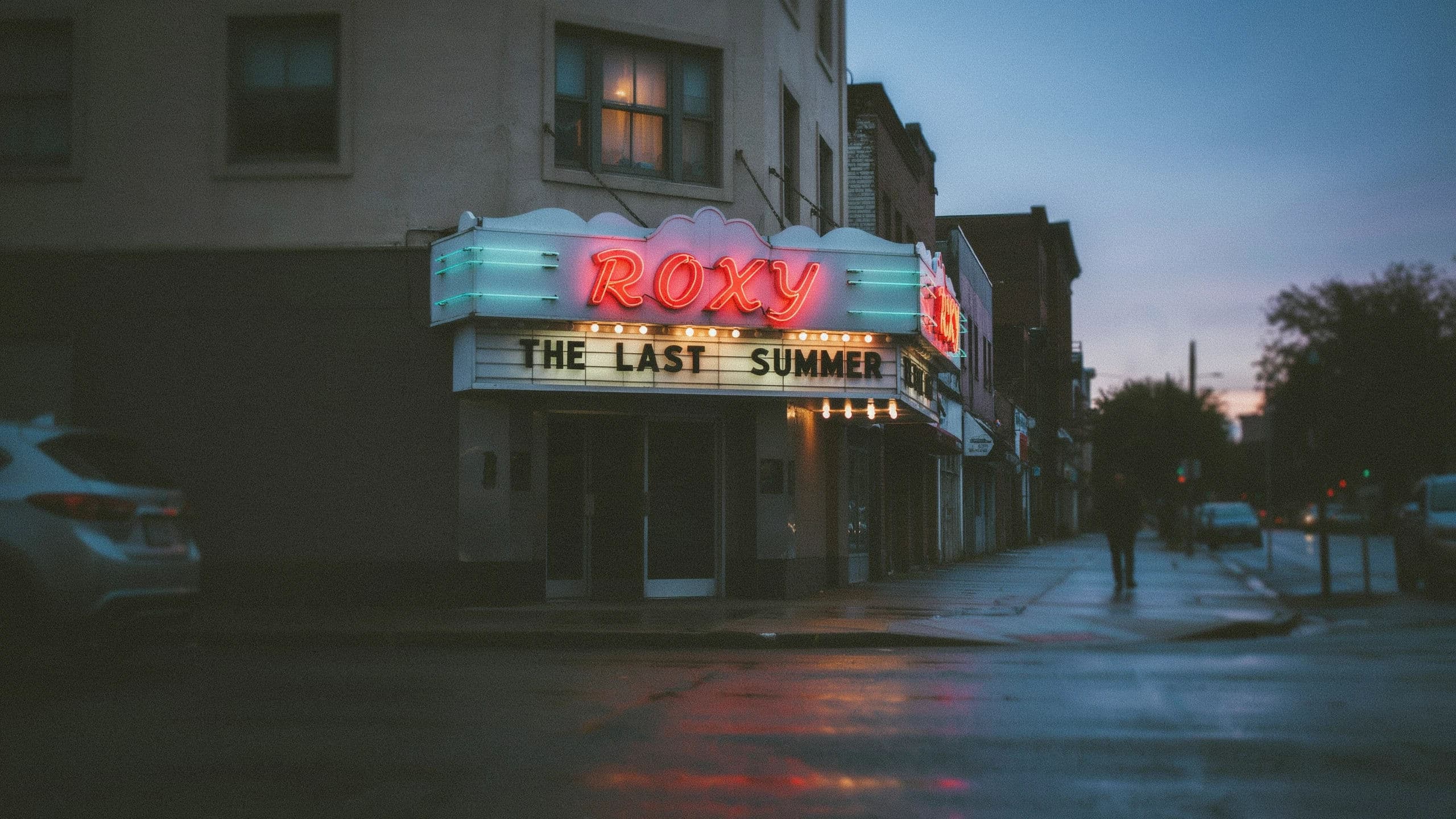 Wide photograph of a cinema marquee with a lit neon border and letters slotted below, generated with Ideogram 4.0