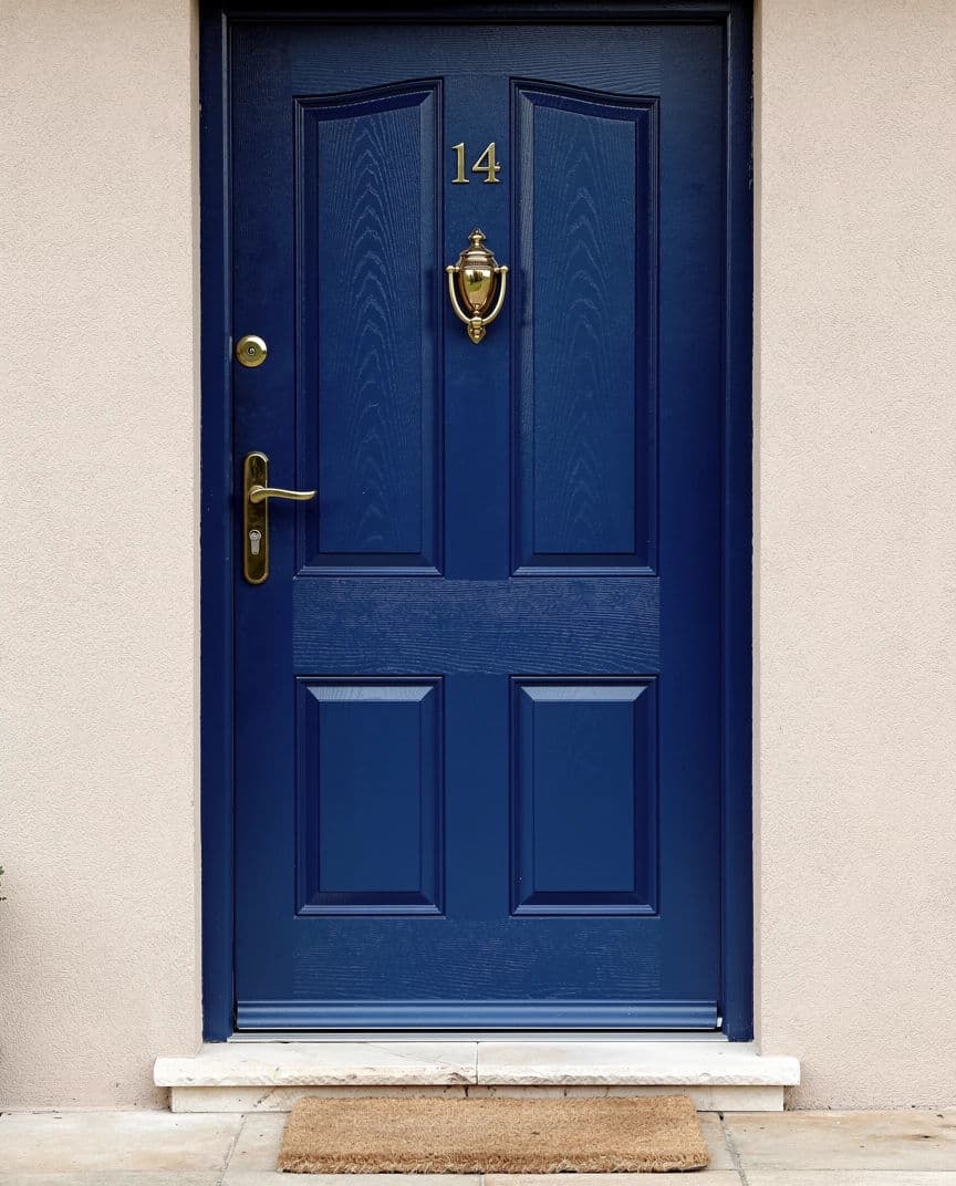 Listing photograph of a saturated blue painted front door photographed in flat frontal light, generated with Flux 2 Pro