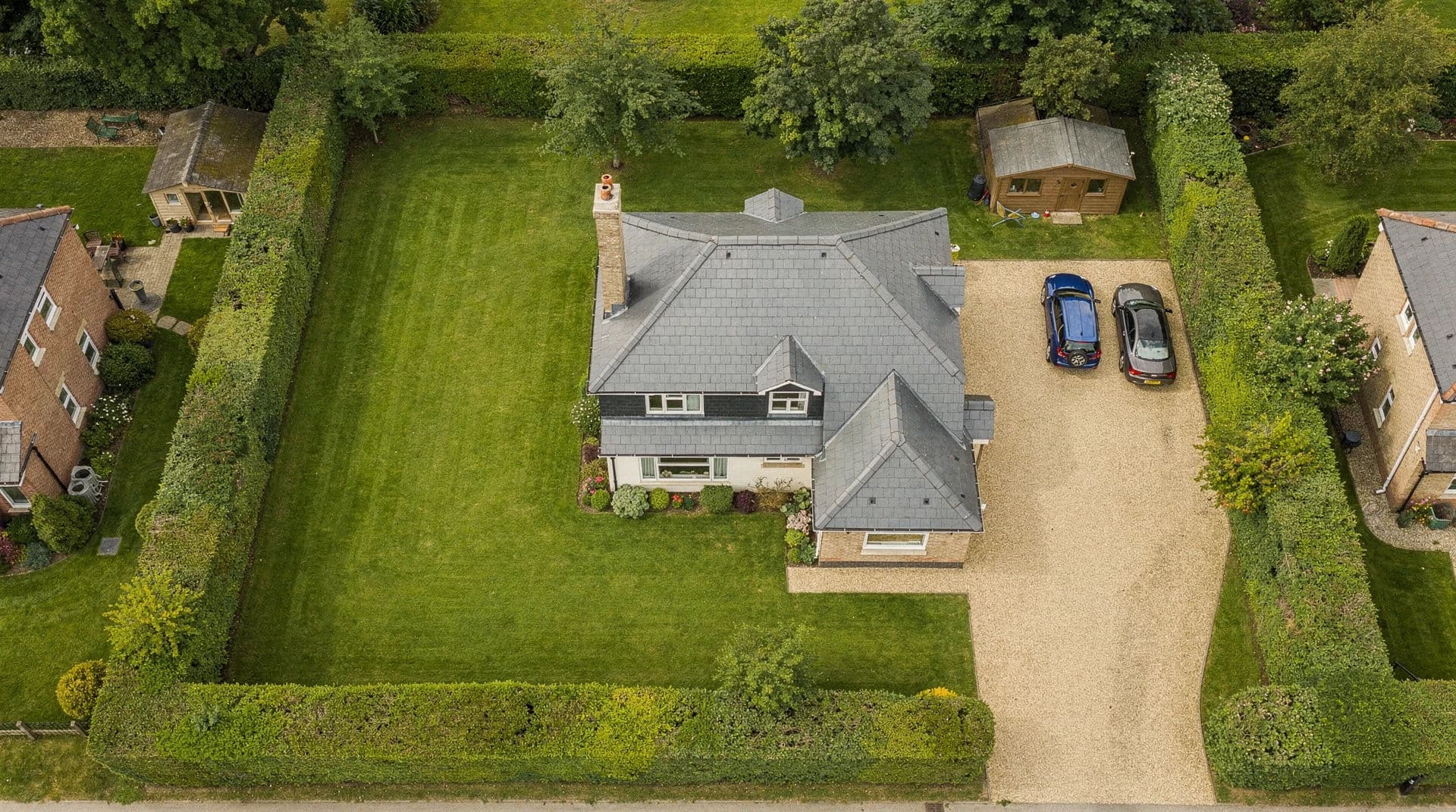 Aerial listing photograph showing a house and the full extent of its plot, generated with Flux 2 Pro