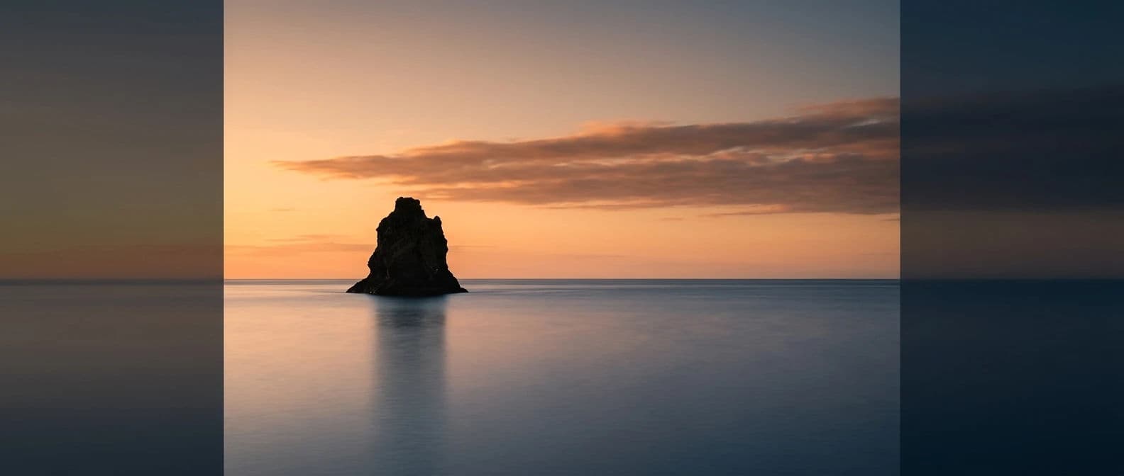 Ultra wide profile banner of a coastal horizon with the subject held in the centre third, generated with Nano Banana 2