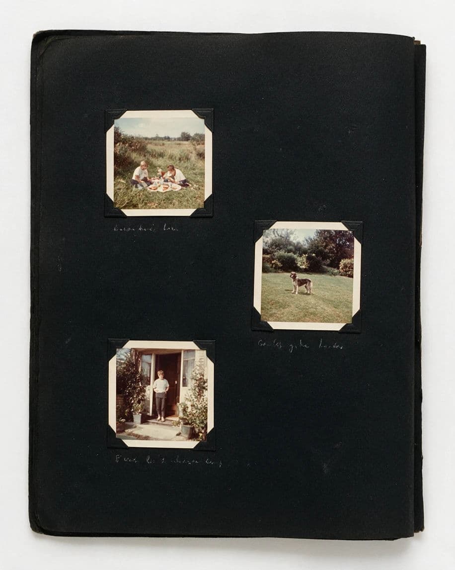 Vintage photo album page with three colour prints held by black paper corners, generated with Seedream 5.0 Pro