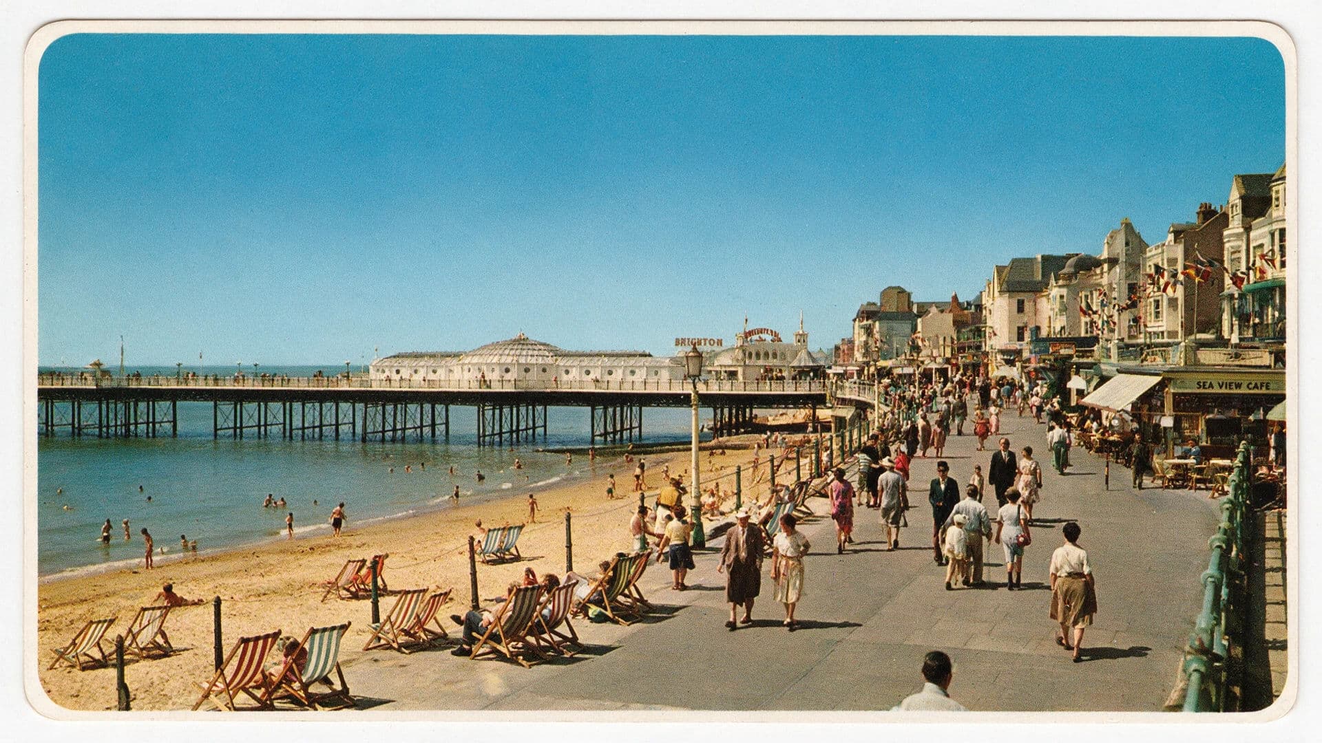 Vintage colour postcard of a seafront with an unnaturally retouched blue sky, generated with Seedream 5.0 Pro