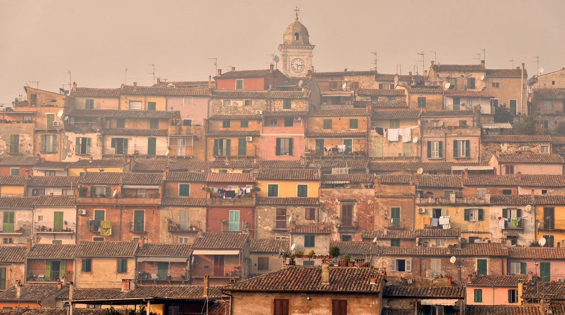 Compressed telephoto view of stacked hillside houses, generated with Flux
