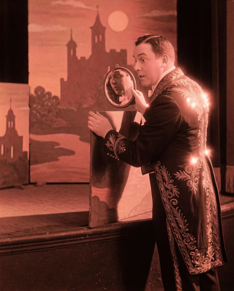Two-strip Technicolor style frame of a stage magician in red and green only, generated with Krea