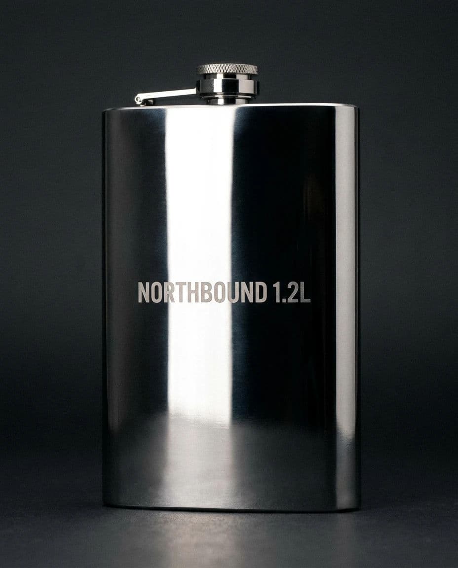 Etched text on a curved reflective bottle, generated with Nano Banana