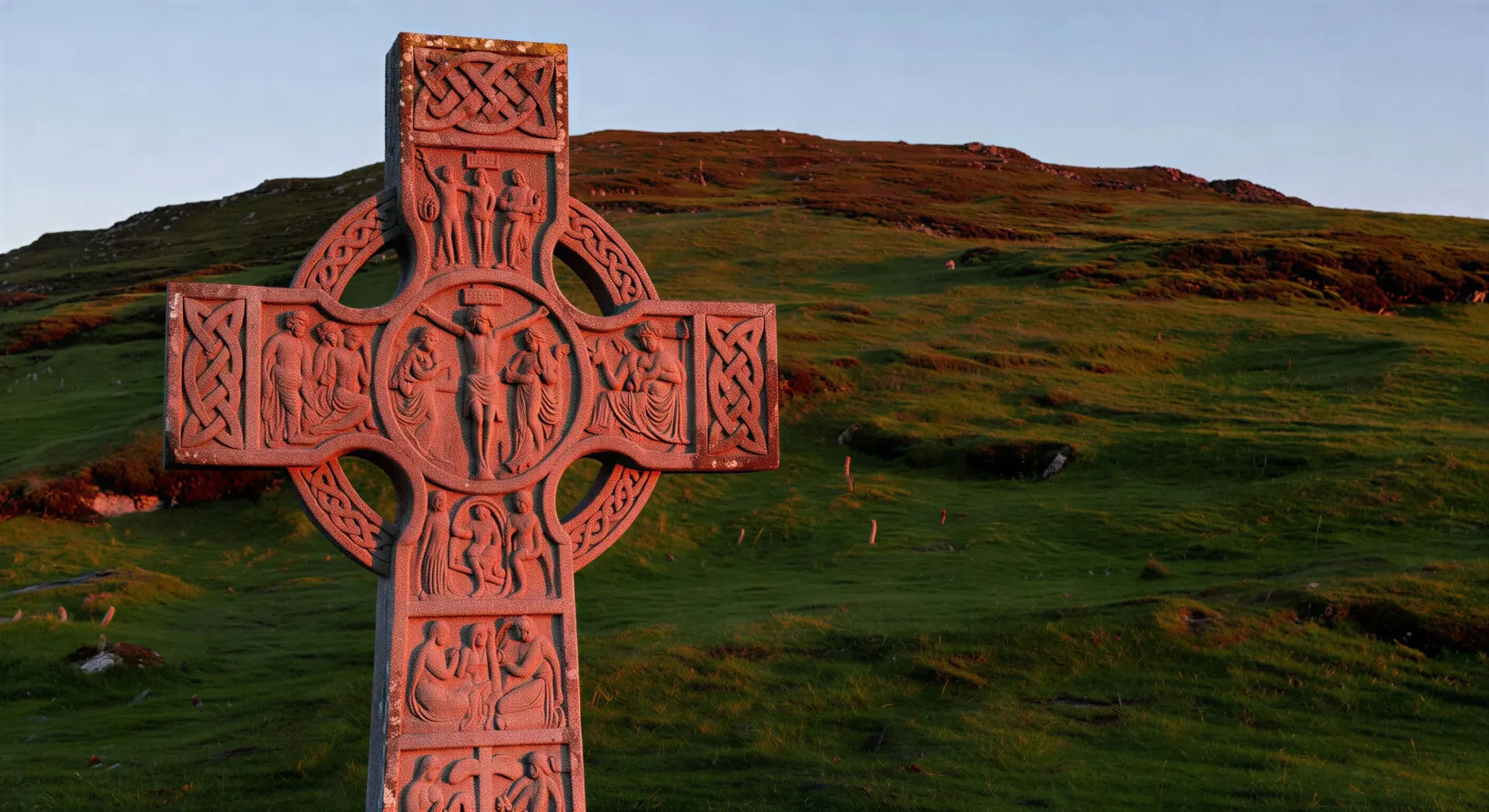 Irish high cross at sunset